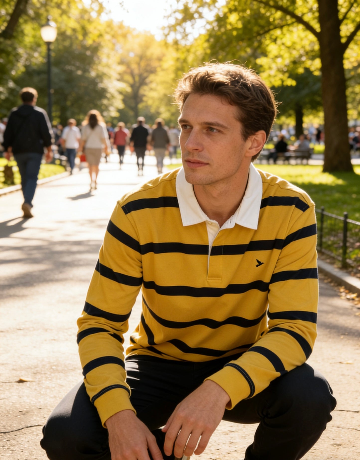 Man’s yellow and navy blue striped long-sleeve rugby shirt with white collar