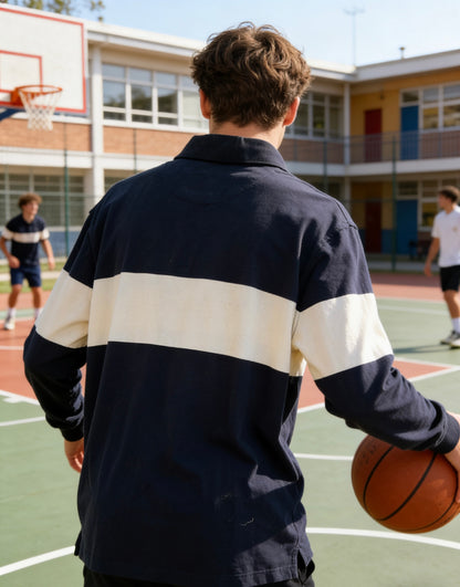 Man’s navy blue and cream color-blocked long-sleeve rugby shirt with small logo embroidery