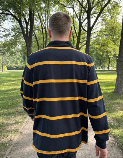Man’s navy blue and gold striped long-sleeve rugby shirt