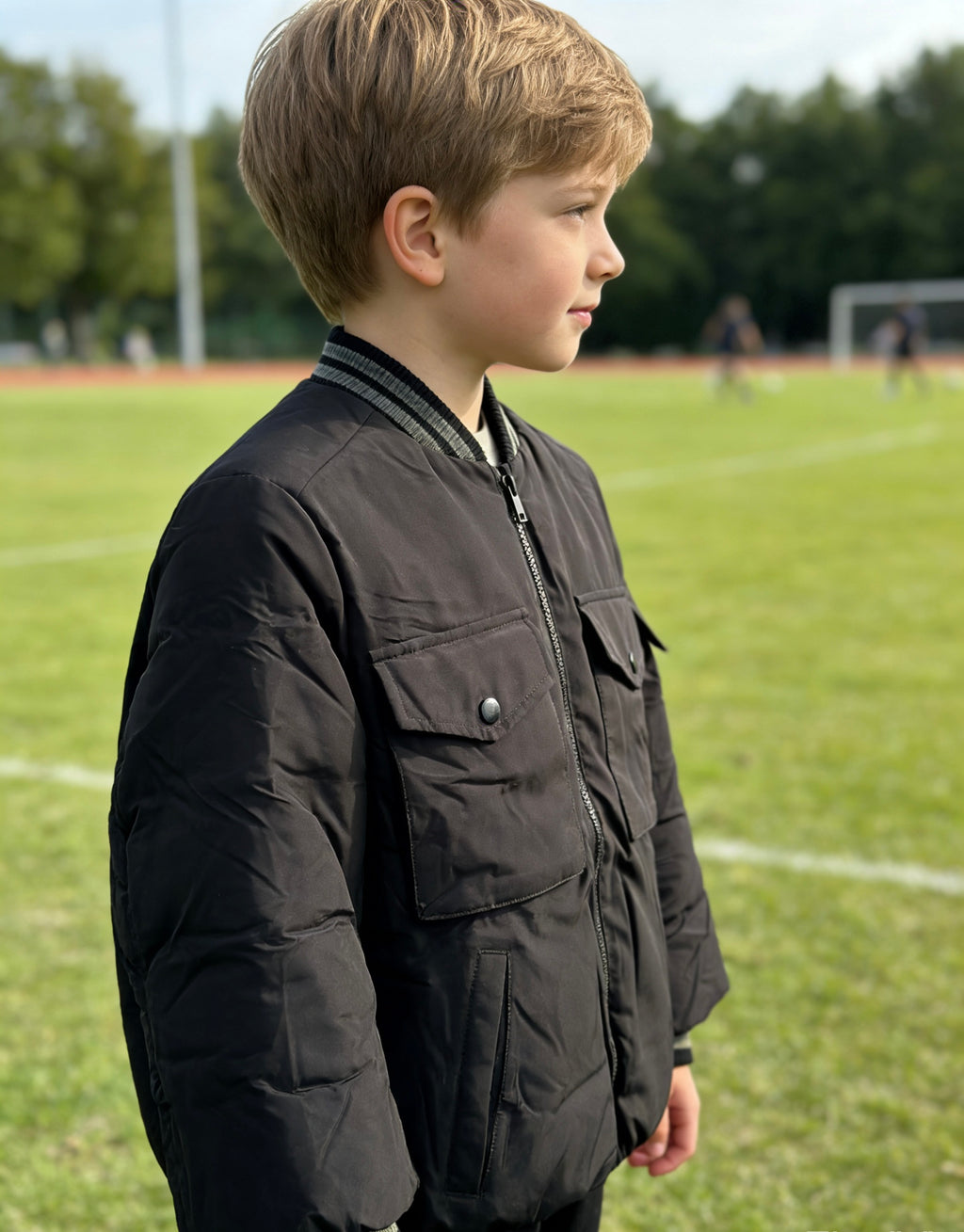 Boys' Black Quilted Bomber Jacket with Flap Pockets & Ribbed Trim