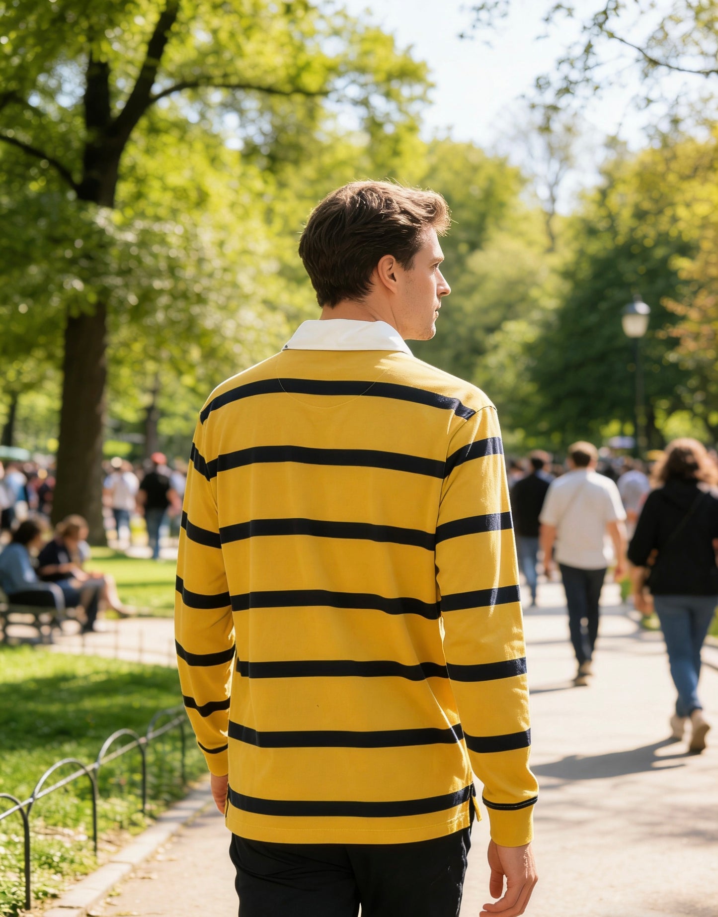 Man’s yellow and navy blue striped long-sleeve rugby shirt with white collar
